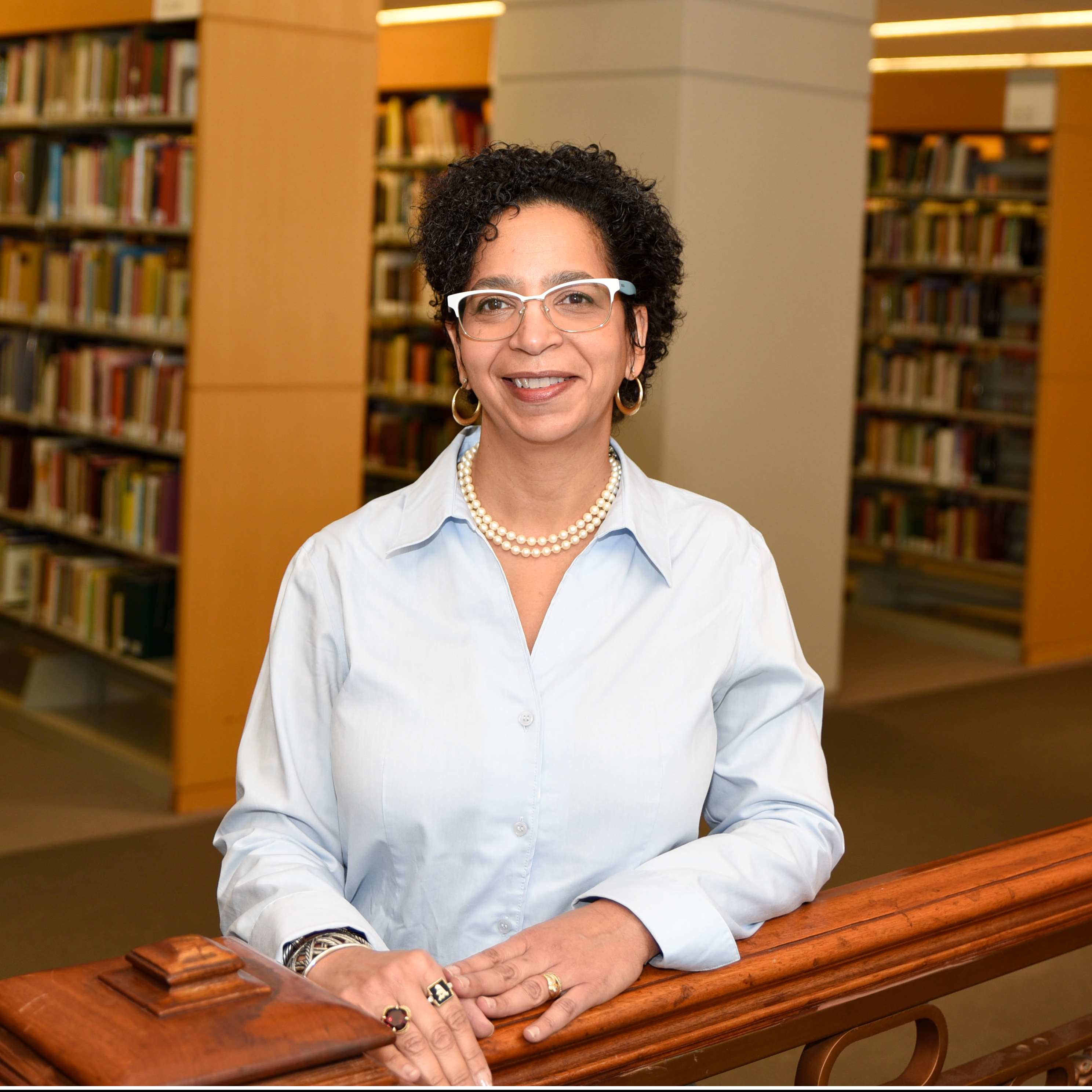 Dr. Jill Bargonetti in a library. 